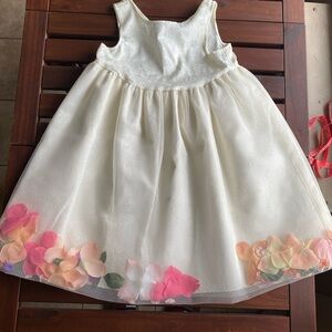 Moa Elegant Cream Dress with Floral Hem